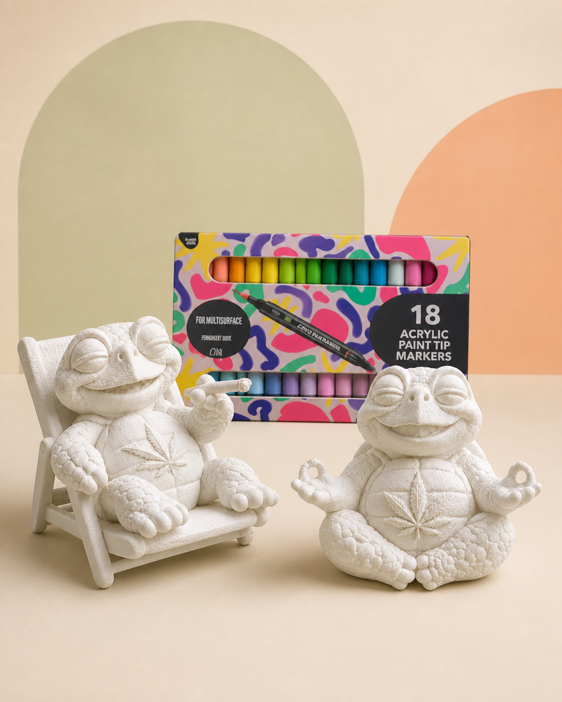 Shellax Bemalset für zwei mit Baddie und Shelly als weißen Figuren sowie einem Etui mit 18 Acrylmarkern.